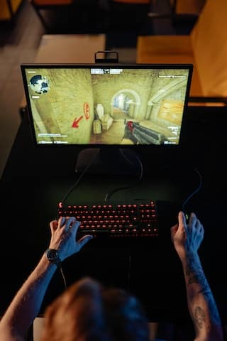 Guy playing a PC game on AMD Radeon RX 6900 XT